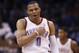 Oklahoma City Thunder guard Russell Westbrook (0) gestures following a three point basket in the second quarter of an NBA basketball game against the Philadelphia 76ers in Oklahoma City, Tuesday, March 4, 2014. (AP Photo/Sue Ogrocki)