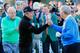 Gary Player, left, watches as Jack Nicklaus reacts to his tee shot on the first hole during the par three competition at the Masters golf tournament Wednesday, April 9, 2014, in Augusta, Ga. (AP Photo/Darron Cummings)