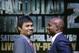 Boxer Manny Pacquiao, left, of the Phillipines, glances back during a photo opportunity with Timothy Bradley of Indio, Ca., the current WBO World Welterweight champion, during a press conference,Thursday, Feb. 6, 2014, in New York. The pair will face off in a WBO World Welterweight title fight April 12, 2014, in Las Vegas. (AP Photo/Kathy Willens)