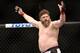 Roy Nelson celebrates his win over Cheick Kongo after their UFC 159 Mixed Martial Arts heavyweight bout in Newark, NJ, Saturday, April 27,2013. Nelson won via first round KO. (AP Photo/Gregory Payan)