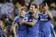 Chelaea's Andre Schuerrle, left, Branislav Ivanovic, centre, and Cesar Azpilicueta celebrate winning the Champions League second leg quarterfinal soccer match between Chelsea and Paris Saint-Germain at Stamford Bridge Stadium in London, Tuesday, April 8, 2014. (AP Photo/Kirsty Wigglesworth)