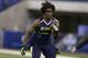 Kent State running back Dri Archer runs a drill at the NFL football scouting combine in Indianapolis, Sunday, Feb. 23, 2014. (AP Photo/Michael Conroy)