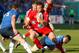 Leinster's Irish Full Back Rob Kearney, left, tries to stop Toulon's hooker Craig Burden of South Africa , center, who runs past Leinster's Irish Centre Brian O'Driscol, bottom, during their Heineken European Cup quarter final rugby match, at the Mayol stadium, in Toulon, southern France, Sunday, April 6, 2014. (AP Photo/Claude Paris)