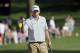 Bill Haas waves to fans during the third round of the Bridgestone Invitational golf tournament Saturday, Aug. 3, 2013 at Firestone Country Club in Akron, Ohio. (AP Photo/Mark Duncan)