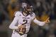 Nov 30, 2013; Columbia, MO, USA; Texas A&M Aggies quarterback Johnny Manziel (2) rolls out against the Missouri Tigers during the first half at Faurot Field. Mandatory Credit: Peter G. Aiken-USA TODAY Sports