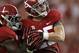 Alabama linebacker Dillon Lee (25) recovers a blocked punt and returns it for a touchdown with Alabama running back Dee Hart (1) during the first half of an NCAA college football game against Colorado State on Saturday, Sept. 21, 2013, in Tuscaloosa, Ala. (AP Photo/Butch Dill)