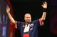 LONDON, ENGLAND - DECEMBER 20: Raymond Van Barneveld of Holland celebrates after winning his second round match against Jamie Caven of England during the Ladbrokes.com World Darts Championship on Day Eight at Alexandra Palace on December 20, 2013 in London, England. (Photo by Charlie Crowhurst/Getty Images)