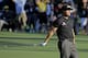 Phil Mickelson reacts after putting his third shot into the water on the 15th hole during the first round of the Masters golf tournament Thursday, April 10, 2014, in Augusta, Ga. (AP Photo/David J. Phillip)