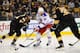 BOSTON, MA - NOVEMBER 29: Rick Nash #61 of the New York Rangers skates with the puck against Johnny Boychuk #55 and Zdeno Chara #33 the Boston Bruins at the TD Garden on November 29, 2013 in Boston, Massachusetts. (Photo by Brian Babineau/NHLI via Getty Images)