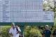 Adam Scott, of Australia, and his caddie Steve Williams walk up the 18th fairway during the first round of the Masters golf tournament Thursday, April 10, 2014, in Augusta, Ga. (AP Photo/David J. Phillip)