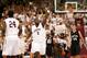 Feb 16, 2013; Bronx, NY, USA; Fordham Rams forward Travion Leonard (2) celebrates on the court against the Butler Bulldogs during the first half at Rose Hill Gym. Mandatory Credit: Debby Wong-USA TODAY Sports