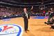 PHILADELPHIA, PA - APRIL 5: Brett Brown of the Philadelphia 76ers addresses the crowd before the game against the Brooklyn Nets at the Wells Fargo Center on April 5, 2014 in Philadelphia, Pennsylvania. NOTE TO USER: User expressly acknowledges and agrees that, by downloading and or using this photograph, User is consenting to the terms and conditions of the Getty Images License Agreement. Mandatory Copyright Notice: Copyright 2014 NBAE (Photo by Jesse D. Garrabrant/NBAE via Getty Images)