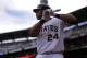 Pittsburgh Pirates' Pedro Alvarez (24) warms up on deck during the first inning of a baseball game against the St. Louis Cardinals in Pittsburgh Sunday, April 6, 2014. The Pirates won 2-1. (AP Photo/Gene J. Puskar)