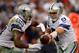 LANDOVER, MD - DECEMBER 22: Tony Romo #9 of the Dallas Cowboys hands the ball off to DeMarco Murray in the second half during an NFL game against the Washington Redskins at FedExField on December 22, 2013 in Landover, Maryland. (Photo by Patrick McDermott/Getty Images)