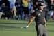 Phil Mickelson reacts after putting his third shot into the water on the 15th hole during the first round of the Masters golf tournament Thursday, April 10, 2014, in Augusta, Ga. (AP Photo/David J. Phillip)