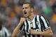 TURIN, ITALY - APRIL 07: Leonardo Bonucci of Juventus celebrates after his team-mate Fernando Lorente scored their second goal during the Serie A match between Juventus and AS Livorno Calcio at Juventus Arena on April 7, 2014 in Turin, Italy. (Photo by Valerio Pennicino/Getty Images)