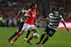 Benfica's Lazar Markovic, from Serbia, fights for the ball with Sporting's Adrien Silva, right, from France, during the Portuguese league soccer match between Benfica and Sporting at Benfica's Luz stadium, in Lisbon, Tuesday, Feb. 11, 2014. (AP Photo/Francisco Seco)