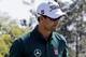 Adam Scott, of Australia, punches the air after making par on the 18th hole during the first round of the Masters golf tournament Thursday, April 10, 2014, in Augusta, Ga. (AP Photo/David J. Phillip)