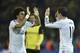 Real's Pepe celebrates with Gareth Bale, right, at the end of the the Champions League quarterfinal second leg soccer match between Borussia Dortmund and Real Madrid in the Signal Iduna stadium in Dortmund, Germany, Tuesday, April 8, 2014. (AP Photo/Martin Meissner)