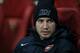 Arsenal's Nicklas Bendtner sits on the substitute's bench before the Group F Champions League soccer match between Arsenal and Marseille at the Emirates stadium in London, Tuesday, Nov. 26, 2013. (AP Photo/Alastair Grant)