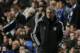 Chelsea's manager Jose Mourinho watches his team play during the Champions League quarterfinal second leg soccer match between Chelsea and Paris Saint Germain at Stamford Bridge stadium in London, Tuesday, April 8, 2014. (AP Photo/Matt Dunham).