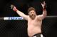 Roy Nelson celebrates his win over Cheick Kongo after their UFC 159 Mixed Martial Arts heavyweight bout in Newark, NJ, Saturday, April 27,2013. Nelson won via first round KO. (AP Photo/Gregory Payan)