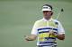 Bubba Watson walks down the 14th fairway during the second round of the Masters golf tournament Friday, April 11, 2014, in Augusta, Ga. (AP Photo/Matt Slocum)