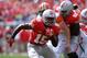 COLUMBUS, OH - SEPTEMBER 21: Ezekiel Elliott #15 of the Ohio State Buckeyes looks for running room as he picks up yardage against the Florida A&M Rattlers in the third quarter at Ohio Stadium on September 21, 2013 in Columbus, Ohio. Ohio State defeated FAMU 76-0. (Photo by Jamie Sabau/Getty Images)