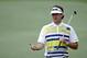 Bubba Watson walks down the 14th fairway during the second round of the Masters golf tournament Friday, April 11, 2014, in Augusta, Ga. (AP Photo/Matt Slocum)
