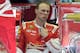 Kevin Harvick reacts as he talks to crew members during a NASCAR Sprint Cup series auto race practice at Darlington Speedway in Darlington, S.C., Friday, April 11, 2014. (AP Photo/Mike McCarn)