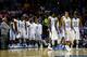 SAN ANTONIO, TX - MARCH 21: Members of the North Carolina Tar Heels celebrate during the closing seconds of their 79-77 win over the Providence Friars during the second round of the 2014 NCAA Men's Basketball Tournament at AT&T Center on March 21, 2014 in San Antonio, Texas. (Photo by Tom Pennington/Getty Images)