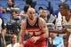 ORLANDO, FL - APRIL 11: Marcin Gortat #4 of the Washington Wizards backs up to the basket against the Orlando Magic during the game on April 11, 2014 at Amway Center in Orlando, Florida. NOTE TO USER: User expressly acknowledges and agrees that, by downloading and or using this photograph, User is consenting to the terms and conditions of the Getty Images License Agreement. Mandatory Copyright Notice: Copyright 2014 NBAE (Photo by Fernando Medina/NBAE via Getty Images)
