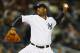 Boston Red Sox batter Grady Sizemore, right, rounds the bases after hitting a three-run home run as New York Yankees pitcher CC Sabathia looks on during the sixth inning of a baseball game Friday, April 11, 2014, at Yankee Stadium in New York. (AP Photo/Bill Kostroun)
