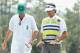AUGUSTA, GA - APRIL 11: Bubba Watson of the United States talks with his caddie Ted Scott after completing the second round of the 2014 Masters Tournament at Augusta National Golf Club on April 11, 2014 in Augusta, Georgia. (Photo by Andrew Redington/Getty Images)