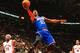 TORONTO, CANADA - April 11: Carmelo Anthony #7 of the New York Knicks shoots against John Salmons #25 of the Toronto Raptors on April 11, 2014 at the Air Canada Centre in Toronto, Ontario, Canada. NOTE TO USER: User expressly acknowledges and agrees that, by downloading and or using this Photograph, user is consenting to the terms and conditions of the Getty Images License Agreement. Mandatory Copyright Notice: Copyright 2014 NBAE (Photo by Ron Turenne/NBAE via Getty Images)