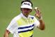 Apr 11, 2014; Augusta, GA, USA; Bubba Watson holds up a ball after making a putt on the 10th hole during the second round of the 2014 The Masters golf tournament at Augusta National Golf Club. Mandatory Credit: Michael Madrid-USA TODAY Sports