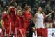 Bayern players celebrate at the end of the Champions League quarterfinal second leg soccer match between Bayern Munich and Manchester United in the Allianz Arena in Munich, Germany, Wednesday, April 9, 2014. Bayern won 3-1 to win the tie 4-2 on aggregate. (AP Photo/Matthias Schrader)