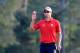AUGUSTA, GA - APRIL 11: Adam Scott of Australia waves on the 18th hole during the second round of the 2014 Masters Tournament at Augusta National Golf Club on April 11, 2014 in Augusta, Georgia. (Photo by Rob Carr/Getty Images)