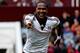 BIRMINGHAM, ENGLAND - APRIL 05: Hugo Rodallega of Fulham celebrates scoring the winning goal during the Barclays Premier League match between Aston Villa and Fulham at Villa Park on April 5, 2014 in Birmingham, England. (Photo by Ben Hoskins/Getty Images)