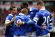 Everton's Gerard Deulofeu, center, celebrates after his shot was turned into the goal by Sunderland's Wes Brown during their English Premier League soccer match at the Stadium of Light, Sunderland, England, Saturday, April 12, 2014. (AP Photo/Scott Heppell)