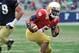 Notre Dame quarterback Everett Golson sprints to the end zone during their spring NCAA college football game Saturday April 12, 2014, in South Bend, Ind. The Blue Gold game marks the end of spring football practice. (AP Photo/Joe Raymond)