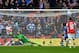 LONDON, ENGLAND - APRIL 12: Jordi Gomez of Wigan Athletic scores the first goal from the penalty spot past Lukasz Fabianski of Arsenal during the FA Cup Semi-Final match between Wigan Athletic and Arsenal at Wembley Stadium on April 12, 2014 in London, England. (Photo by Mike Hewitt/Getty Images)