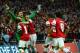 LONDON, ENGLAND - APRIL 12: Lukasz Fabianski of Arsenal celebrates winning the penalty shoot out with team mates during the FA Cup Semi-Final match between Wigan Athletic and Arsenal at Wembley Stadium on April 12, 2014 in London, England. (Photo by Shaun Botterill/Getty Images)