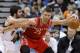 Houston Rockets forward Chandler Parsons (25) tries to drive against Minnesota Timberwolves guard Ricky Rubio (9), of Spain, during the third quarter of an NBA basketball game in Minneapolis, Friday, April 11, 2014. The Timberwolves won 112-110. (AP Photo/Ann Heisenfelt)