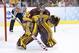 Minnesota's Adam Wilcox in action during the first period of an NCAA men's college hockey Frozen Four tournament game against North Dakota, Thursday, April 10, 2014, in Philadelphia. Minnesota won 2-1. (AP Photo/Chris Szagola)