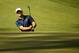 Apr 12, 2014; Augusta, GA, USA; Jordan Spieth chips onto the 10th green during the third round of the 2014 The Masters golf tournament at Augusta National Golf Club. Mandatory Credit: Jack Gruber-USA TODAY Sports