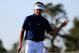 AUGUSTA, GA - APRIL 12: Bubba Watson of the United States waves on the 17th green during the third round of the 2014 Masters Tournament at Augusta National Golf Club on April 12, 2014 in Augusta, Georgia. (Photo by Rob Carr/Getty Images)