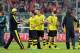 Dortmund head coach Juergen Klopp, left, congratulates his players after the soccer match between FC Bayern Munich and Borussia Dortmund in Munich, Germany, on Saturday, April 12, 2014. Dortmund won by 3-0. (AP Photo/Kerstin Joensson)