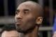 Los Angeles Lakers' Kobe Bryant looks on from the bench during the second half of an NBA basketball game against the New York Knicks at Madison Square Garden, Sunday, Jan. 26, 2014, in New York. The Knicks defeated the Lakers 110-103. (AP Photo/Seth Wenig)