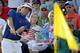 Bubba Watson chips to the 18th green during the third round of the Masters golf tournament Saturday, April 12, 2014, in Augusta, Ga. (AP Photo/David J. Phillip)